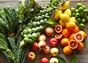 a group of fruits and vegetables on a wood surface Healthy Weight Loss Diets South Side